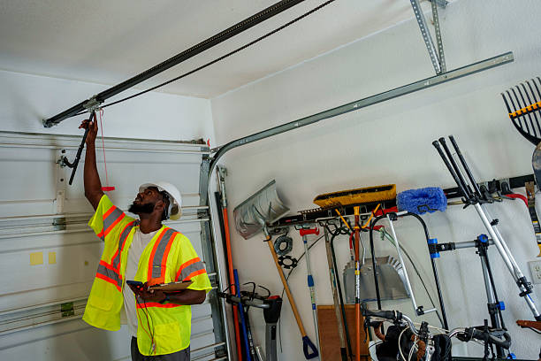 Professional Garage Door Panel Replacement technician working in Wells County County, ND
